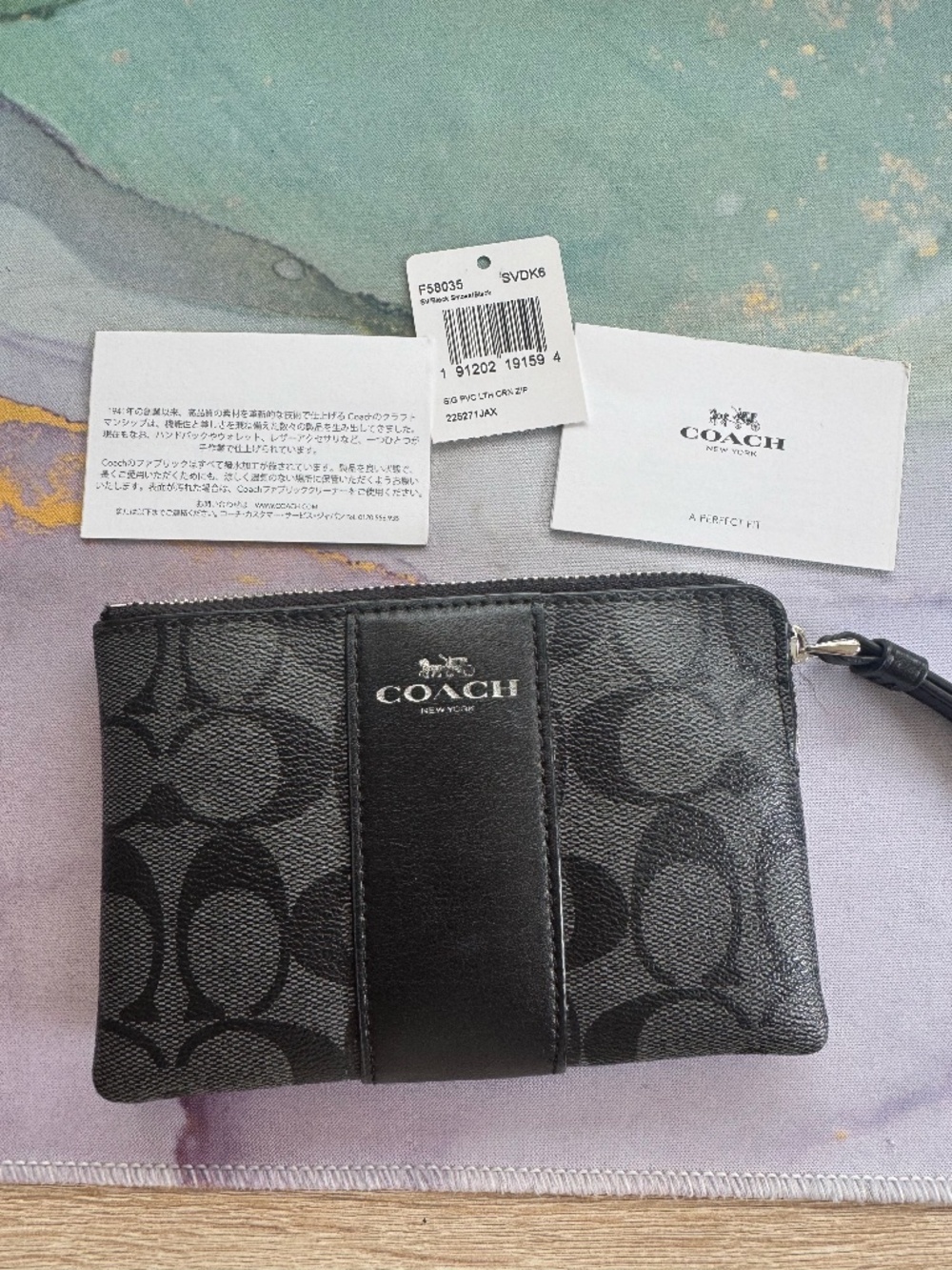 Coach Signature PVC/Leather Corner Zip Wristlet in Black
